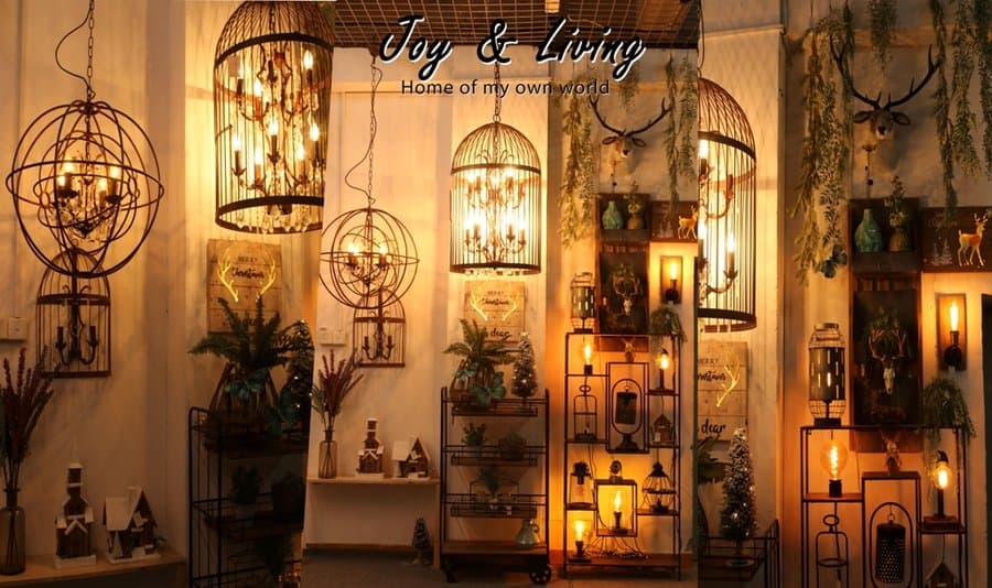 Joy & Living showroom — chandelier wall