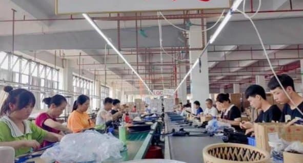 Workshop floor with assembly teams in production